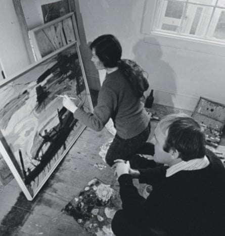 Valerie Marshall Strong Olsen painting Winter Shadow in her Watsons Bay home in 1963 as husband John looks on.