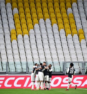 Juventus players celebrate a goal against Inter during their behind-closed-doors game on Sunday