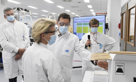 European Commission president Ursula von der Leyen, second left, with Pfizer CEO Albert Bourla, center right, during an official visit to the Pfizer pharmaceutical company in Puurs, Belgium in April 2021