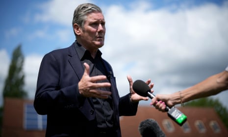 Keir Starmer talks to the media during a campaign event on 29 June in Selby, England.