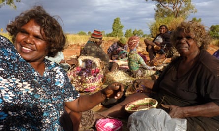 Some of the artists from Tjanpi Desert Weavers, which is a social enterprise in Western Australia.