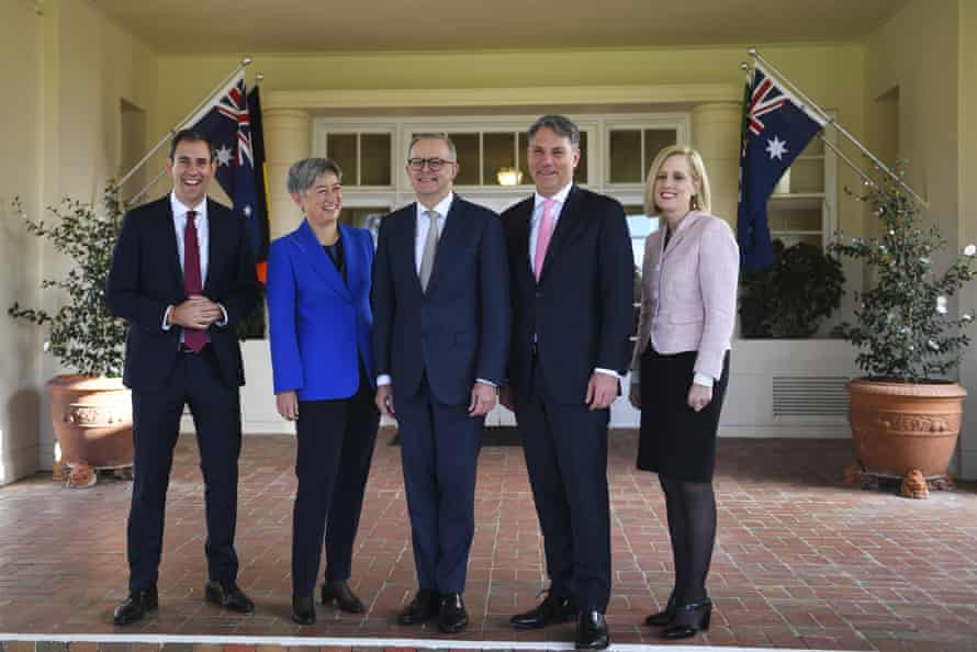 Australian Prime Minister Anthony Albanese poses for photographs with interim ministers Penny Wong, Jim Chalmers, Richard Marles and Katy Gallagher after a swearing-in ceremony at Government House in Canberra, Monday, May 23, 2022.