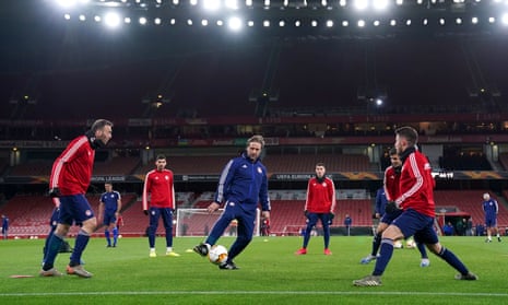 Pedro Martins puts his Olympiakos squad through their paces during a training session at the Emirates Stadium