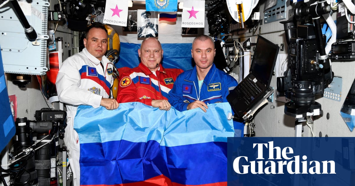 Russian cosmonauts display flag of occupied Luhansk region on ISS