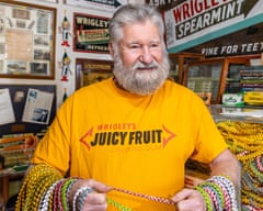 Gary Michael Duschl, who holds the Guinness World Record for the longest intertwined gum wrapper chain at 122,635 feet long, shown holding it