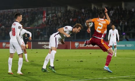 San Marino’s Alessandro D’Addario concedes a penalty against England’s Harry Kane.