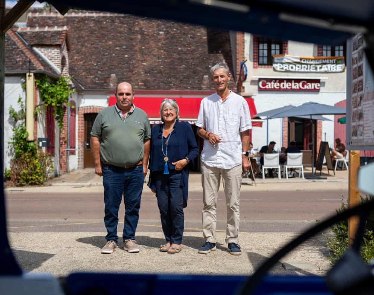 Left to right: Local politicians Hervé Chapuis, Nicole Deviterne, and Arnault Meric in front of the Au Bon Accueil restaurant in Saint-Martin-sur-Ouanne.