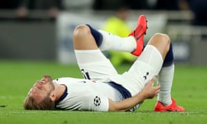 Harry Kane lies on the turf at Wembley.