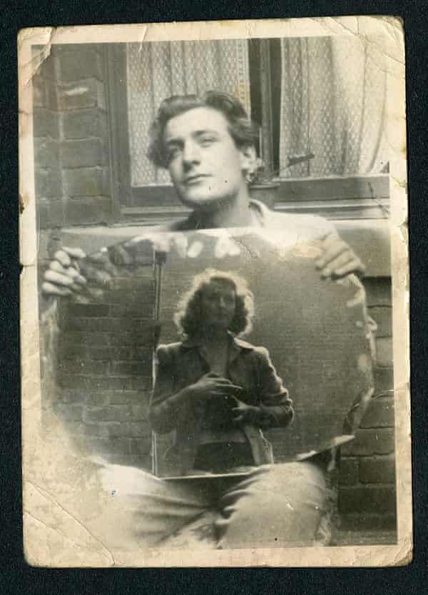 Olwyn Hughes reflected in a mirror as she takes a photograph of her brother Ted, the future poet laureate.