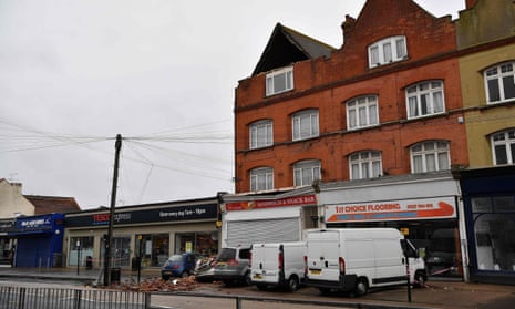 Exposed roof timbers as high winds cause a building to partially collapse in Herne Bay.