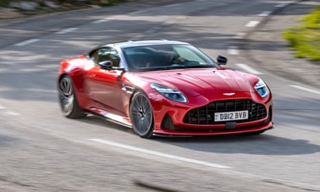 A photo of a red Aston Martin DB12 sportscar.