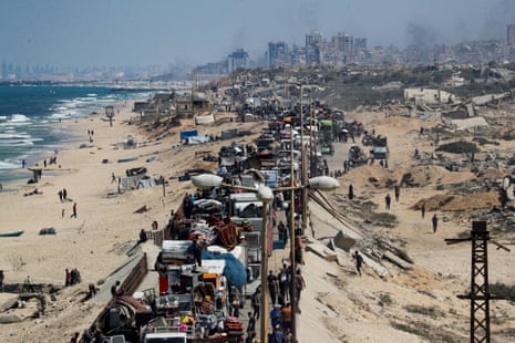 Displaced Palestinians move southward after Israeli forces ordered residents of Gaza City to evacuate to the south.