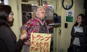 Reaction to the US presidential election results in a bar in Tokyo.