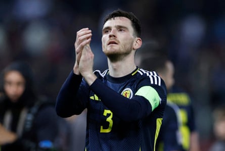 Andy Robertson applauds fans after the match.