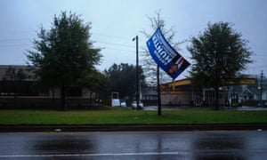 An election campaign sign sits in a tree as Hurricane Zeta sweeps through New Orleans, Louisiana, US on October 28, 2020.