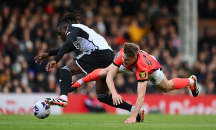 Calvin Bassey challenges Brighton’s Evan Ferguson during Fulham’s 3-0 win.