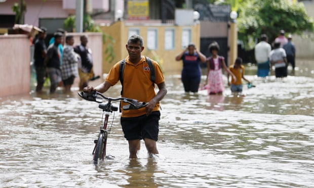  Dodangoda village in Kalutara, Sri Lanka. Rainfall of at least 10cm is expected over the next day and a half. Photograph: Dinuka Liyanawatte/Reuters  