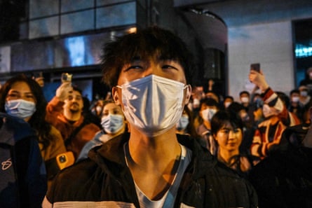People gather on a street in Shanghai last November to protest against China’s zero-Covid policy
