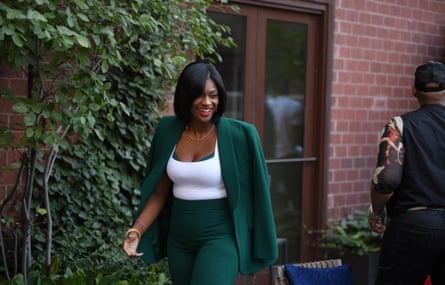 A woman in a green suit