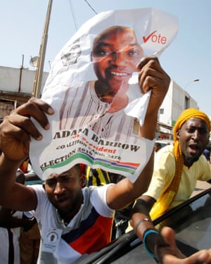 Supporters of President-elect Adama Barrow celebrate his election victory in Banjul.