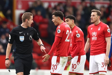 Johnson protests to referee John Brooks.