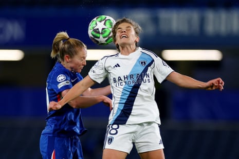 Chelsea's Keira Walsh goes up for a header with Paris FC's Daphne Corboz.