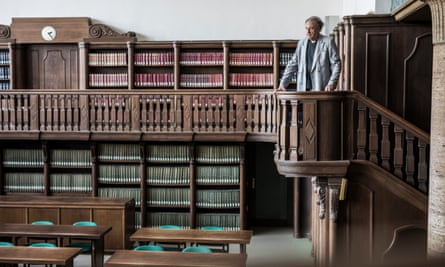 Jürgen Wertheimer, who set up Project Cassandra, in a library