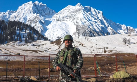 An Indian paramilitary soldier stands guard near the Zojila tunnel, more than 3,000 metres above sea level, which will connect Kashmir Valley and Ladakh on the border with China.