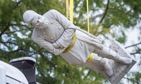 The statue of Confederate Gen Alfred Mouton is removed on Saturday, in Lafayette, Louisiana.