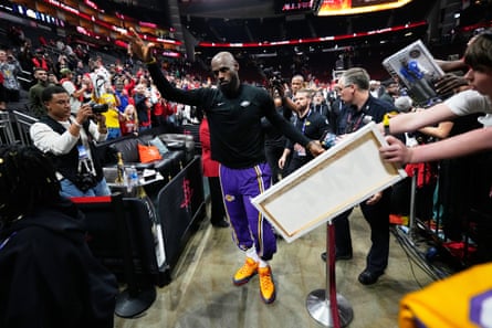 LeBron James walks past fans after the Lakers’ Game 6 win.