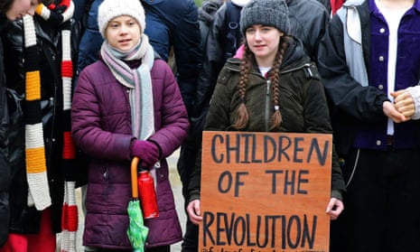 Greta Thunberg (L) takes part in a protest on 5 March, 2020.