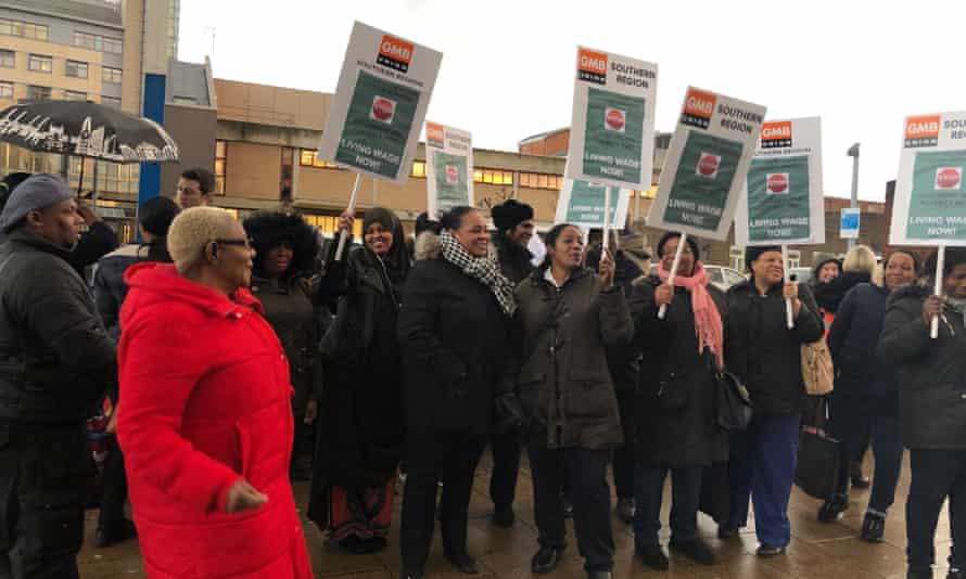 Cleaning staff organised by the GMB union protesting for better pay and conditions at Lewisham Hospital in November 2019.