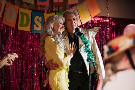 Cynthia (Anita Dobson) and Frank (Nigel Havers) singing their duet on stage. Frank looking directly at camera