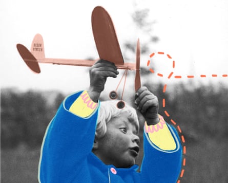 Boy holding a toy plane