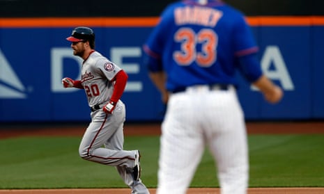 New York Mets pitcher Matt Harvey peels off the uniform in the