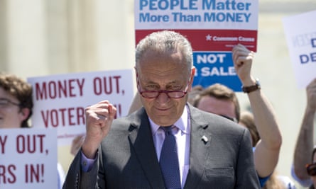 Chuck Schumer, then the Senate minority leader, leads a group of Democrats at the supreme court in announcing the introduction of a previous constitutional amendment that would overturn the Citizens United decision in July 2019.
