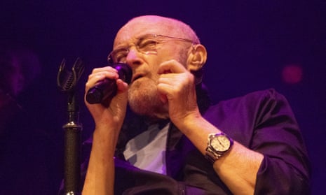 Phil Collins performs on The Last Domino? tour with Genesis.