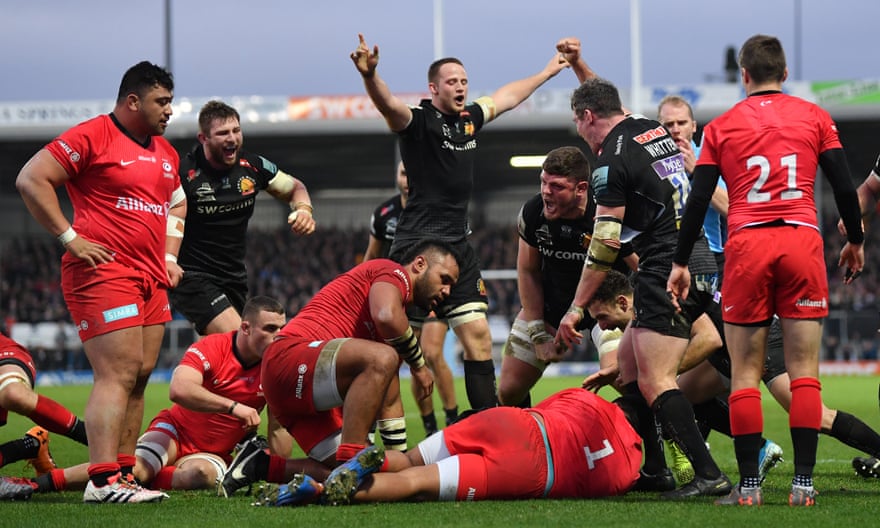 Exeter celebrate as Jacques Vermeulen (hidden) dives over to score his side’s second try against Saracens in December 2019.