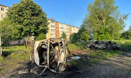 Destroyed vehicles after a reported Ukrainian shelling in Shebekino in May.