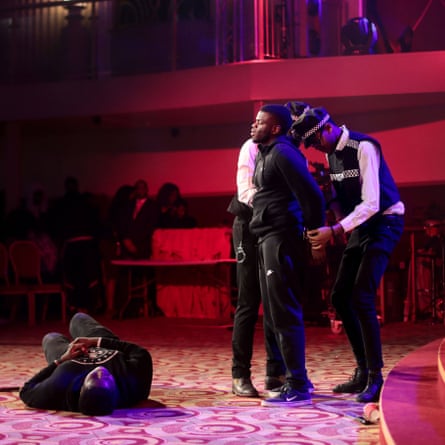 Members of the youth church perform in a knife crime play during a Good Friday performance