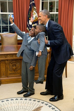 The president has a selfie with 11-year-old Jacob Haynes and 4-year-old James Haynes