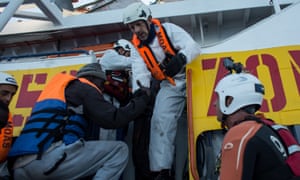 Refugees being transferred to the Moas Phoenix vessel earlier this month.