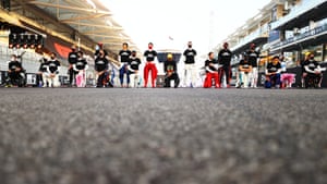 The F1 drivers stand and take a knee