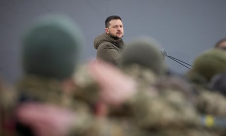 Zelenskiy addresses troops in Kyiv.