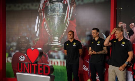 Wes Brown (left), Dimitar Berbatov (centre) and Peter Schmeichel at a promotional event at Manchester United’s Theatre of Dreams ‘entertainment centre’ in Beijing