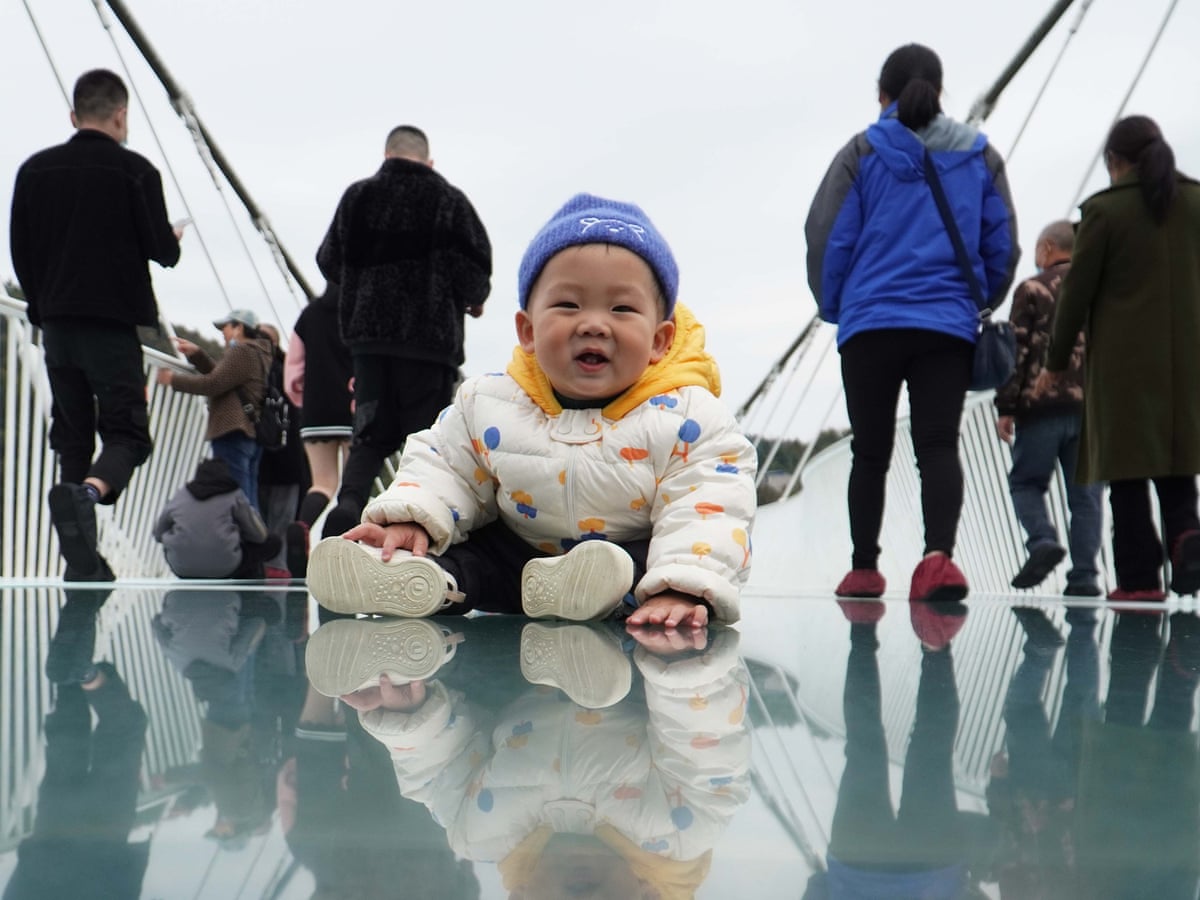 China's population growth rate falls to 61-year low | China | The Guardian