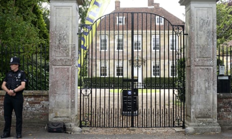 A police officer at the gates of the former home of Sir Edward Heath after claims of child sex abuse against the former prime minister