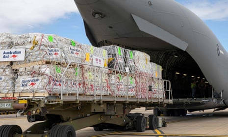 Australian aid supplies are loaded on to a plane at RAAF Amberley
