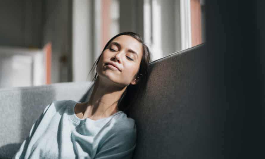 A woman takes a daytime nap.