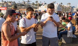 Pokemon Go players on the Santa Monica Pier.